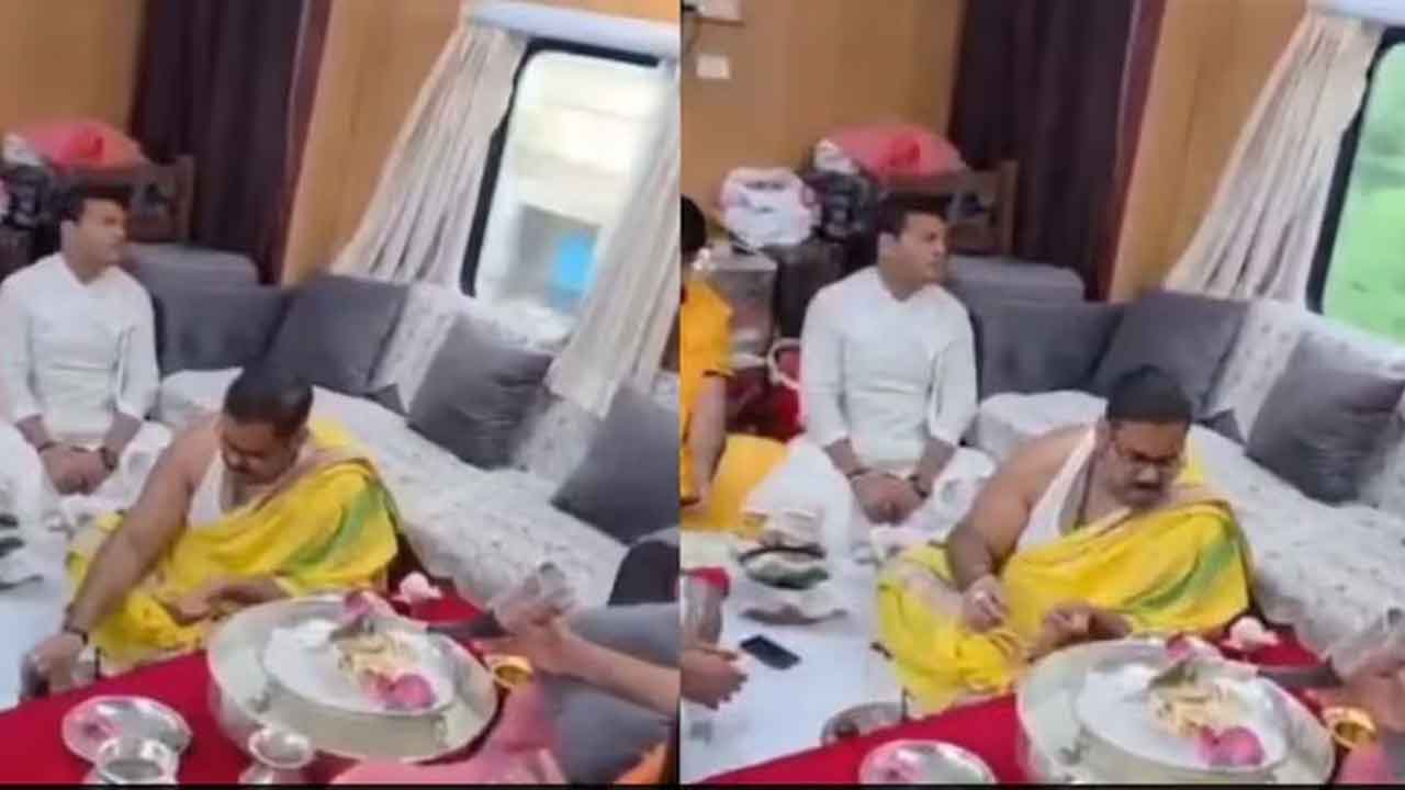 Puja Ritual in Train